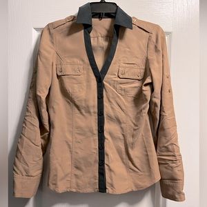 Express beige button down shirt with black detailing.